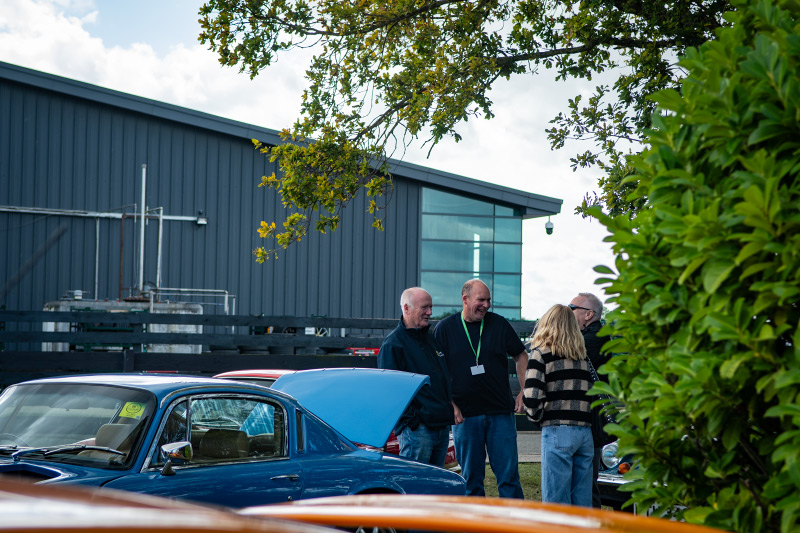 Lotus owners chatting at Hethel Reunion 2025